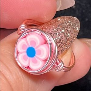 Cute ring -pink daisy in pink tarnish proof wire/wrapped